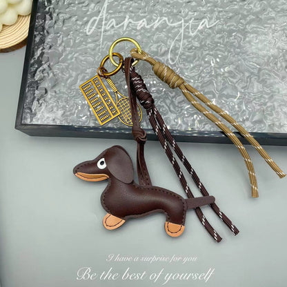 Leather sausage dog bed rope keychain