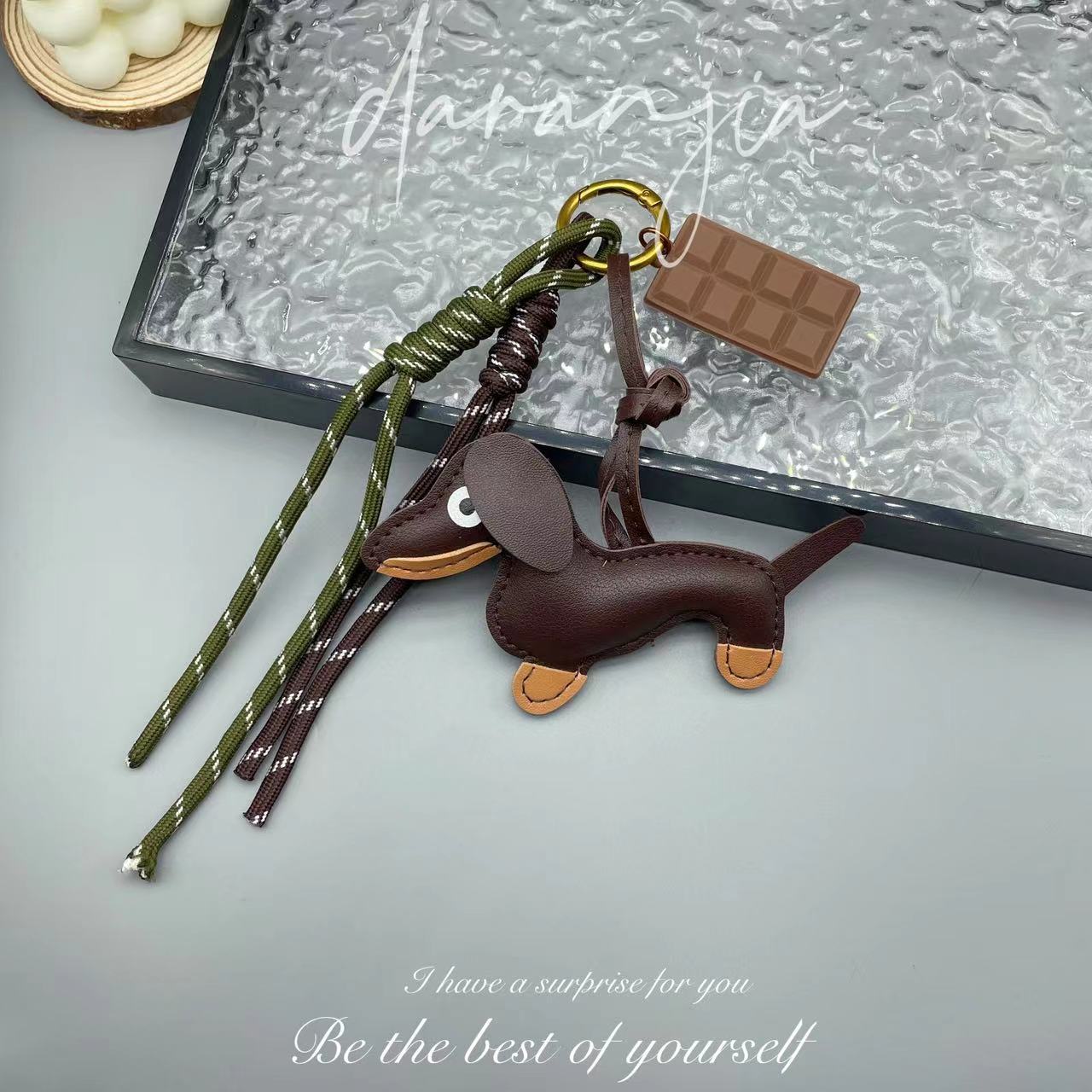 Leather sausage dog bed rope keychain