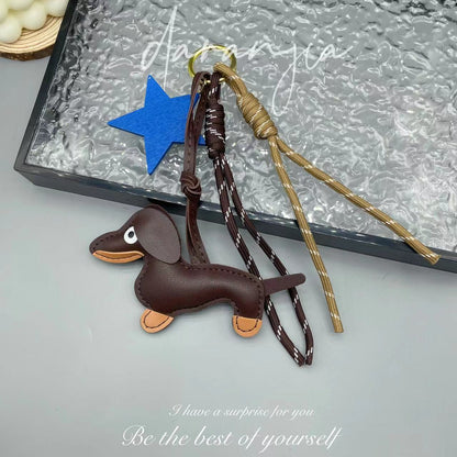 Leather sausage dog bed rope keychain