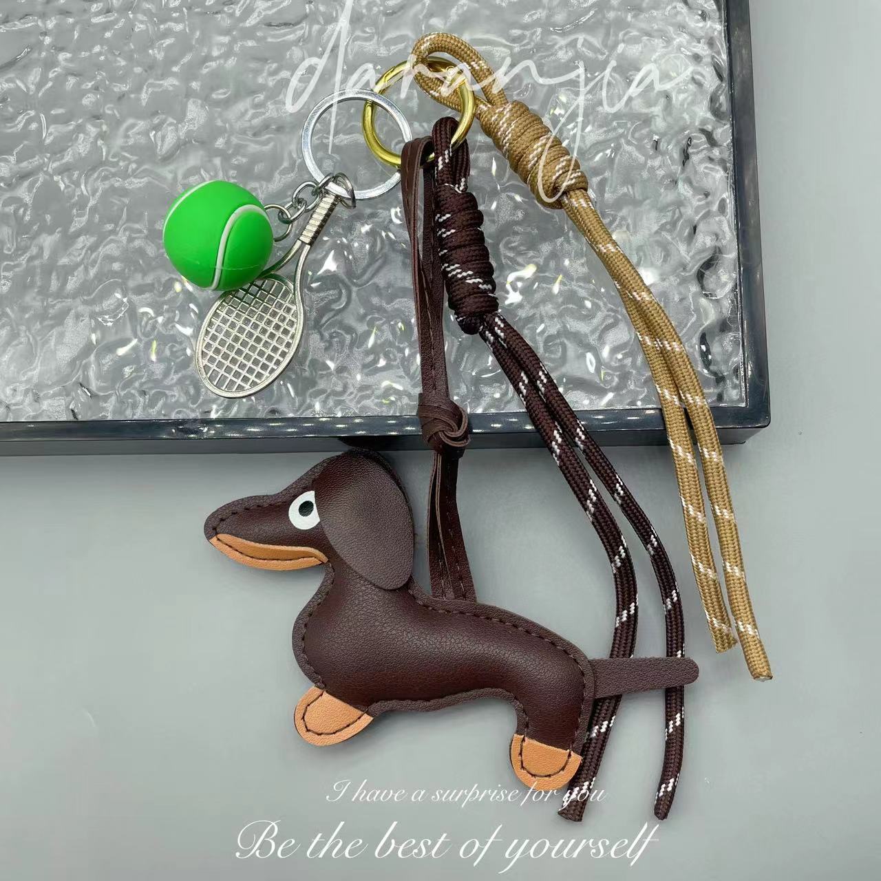 Leather sausage dog bed rope keychain