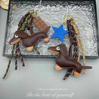 Leather sausage dog bed rope keychain