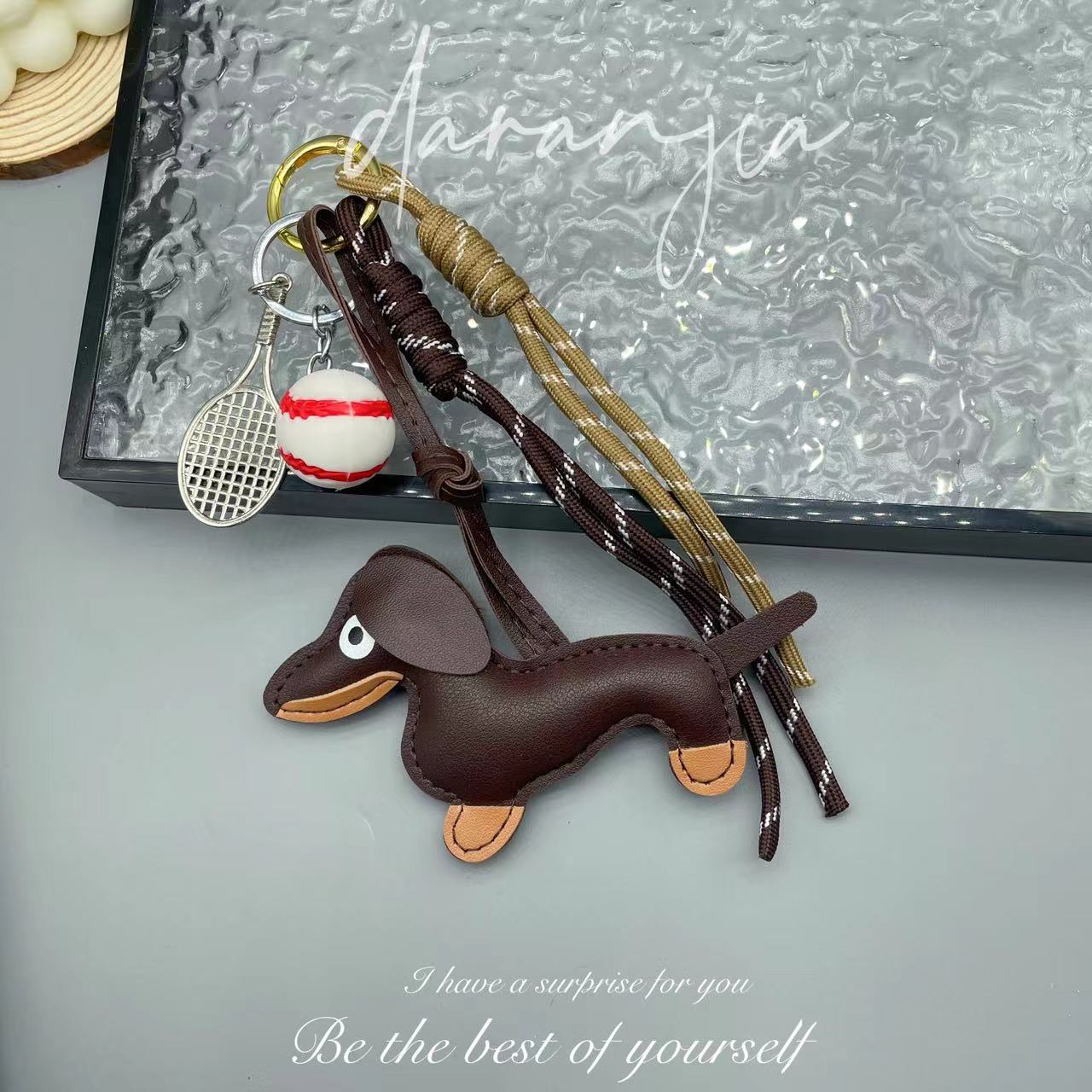 Leather sausage dog bed rope keychain